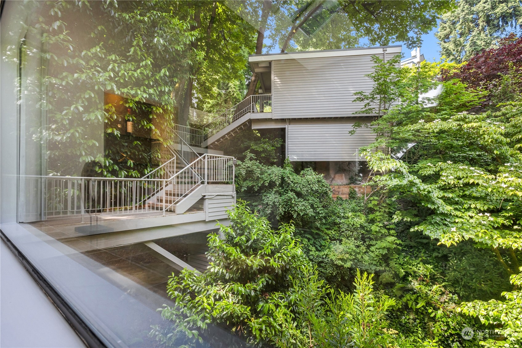 436 36th Avenue Seattle, WA 98122 - Photo 35 of 39 a view of house with yard and sitting area