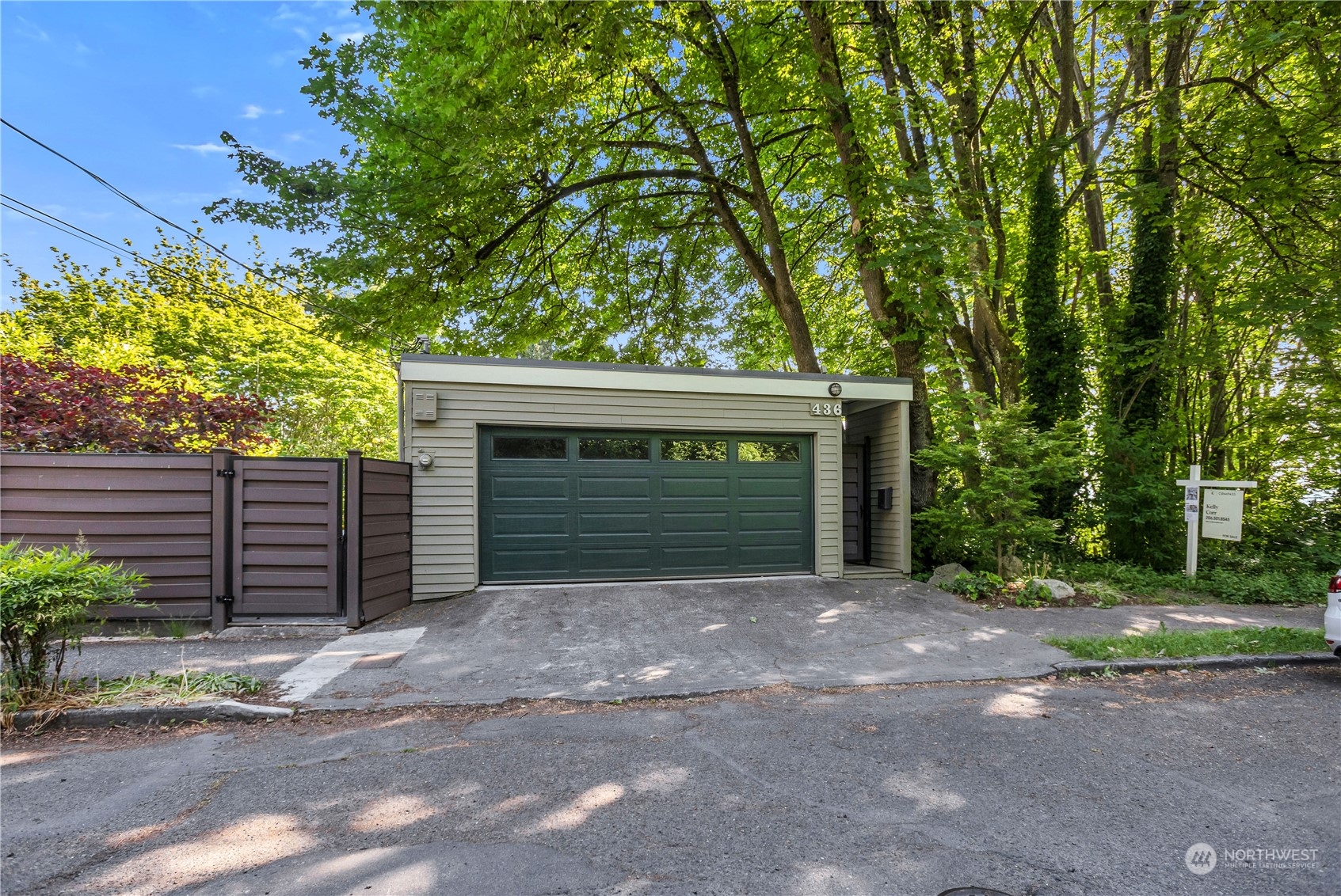 436 36th Avenue Seattle, WA 98122 - Photo 38 of 39 a front view of a house with a garage