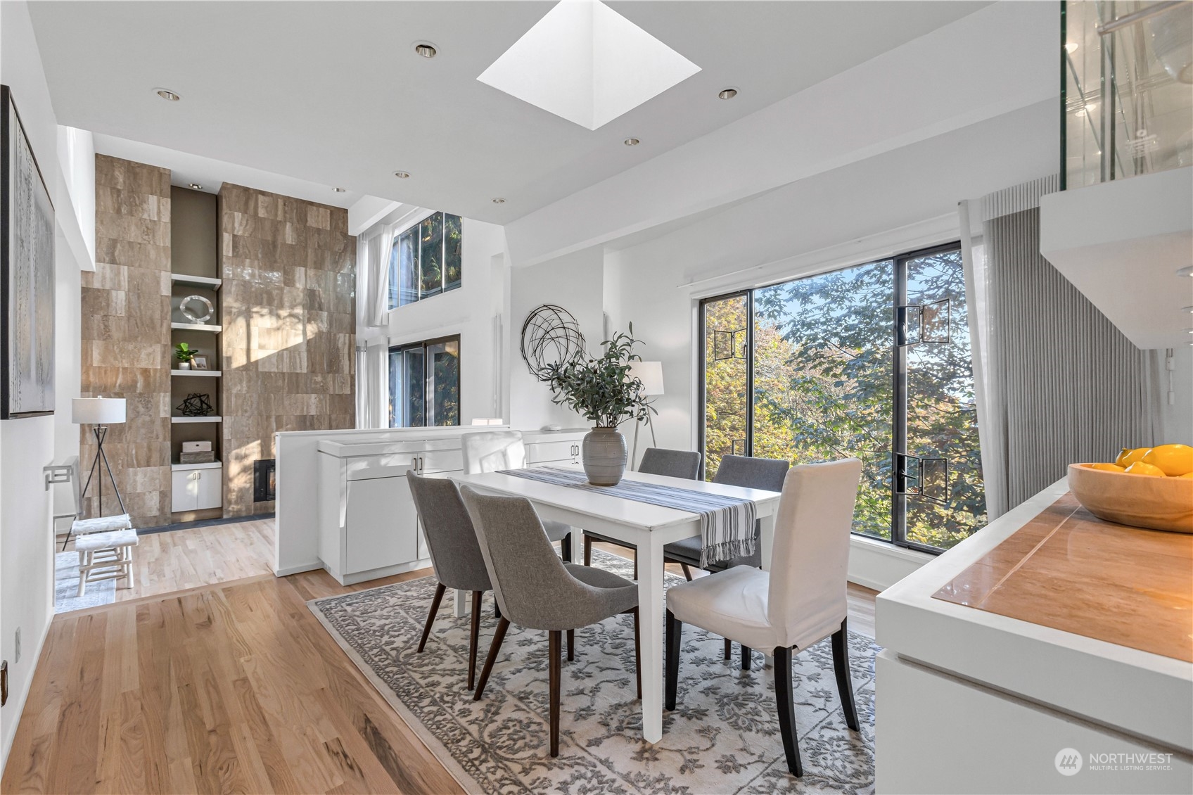 436 36th Avenue Seattle, WA 98122 - Photo 10 of 39 a view of a dining room with furniture window and wooden floor