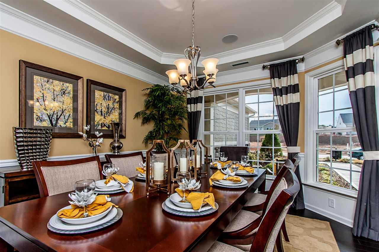 8444 Lentic Court, Unit LOT #53 Raleigh, NC 27615 - Photo 8 of 18 Photo(s) are of model home, actual home is under construction. Some options and colors may vary, see agent for details. Dining Room