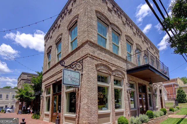 a view of a building with a street