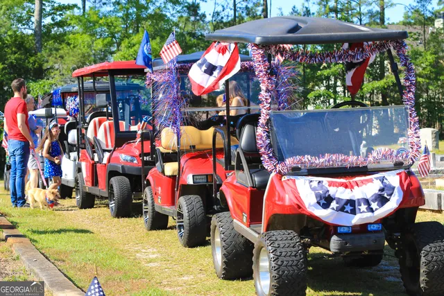a view of a table and chairs under an umbrella