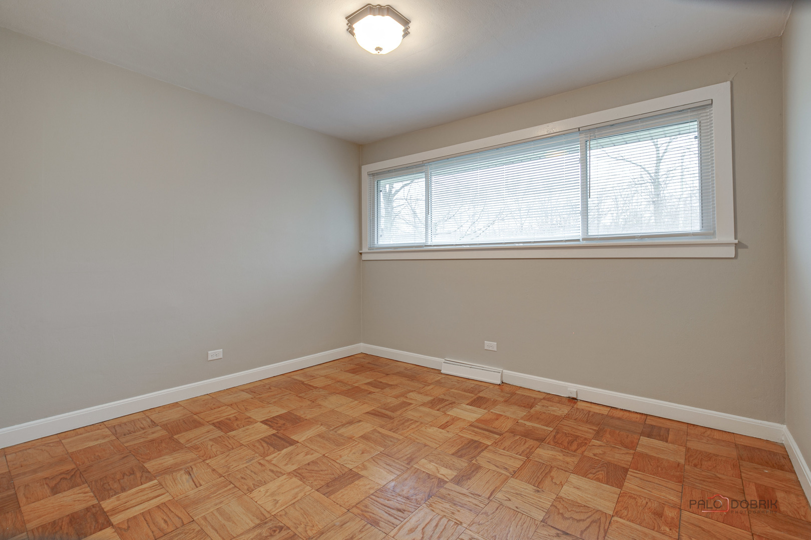 1595 North McKinley Road, Unit 1 Lake Forest, IL 60045 - Photo 15 of 24 an empty room with a window