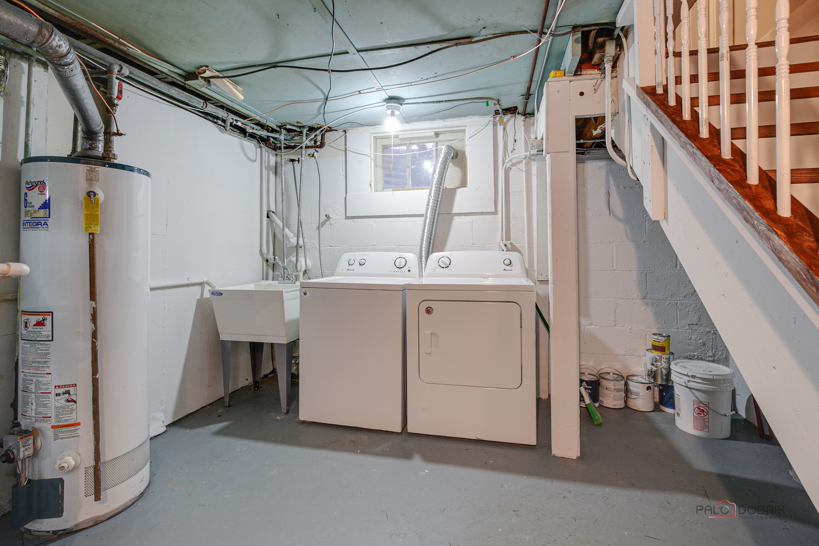 1595 North McKinley Road, Unit 1 Lake Forest, IL 60045 - Photo 19 of 24 a utility room with dryer and washer