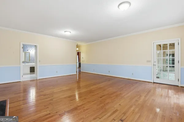 a view of a room with windows