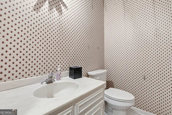 a utility room with cabinets