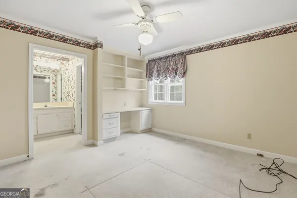 a view of a hallway with closet area