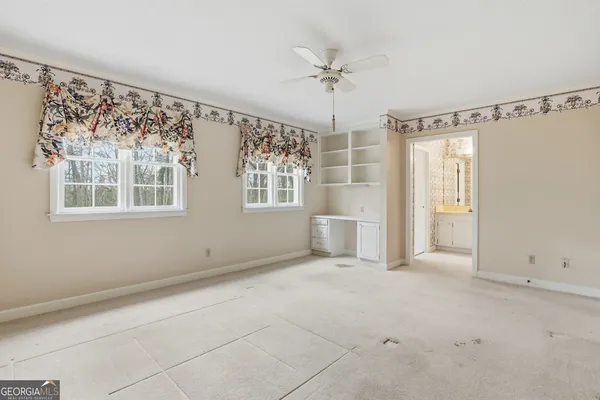 a view of a hallway with closet