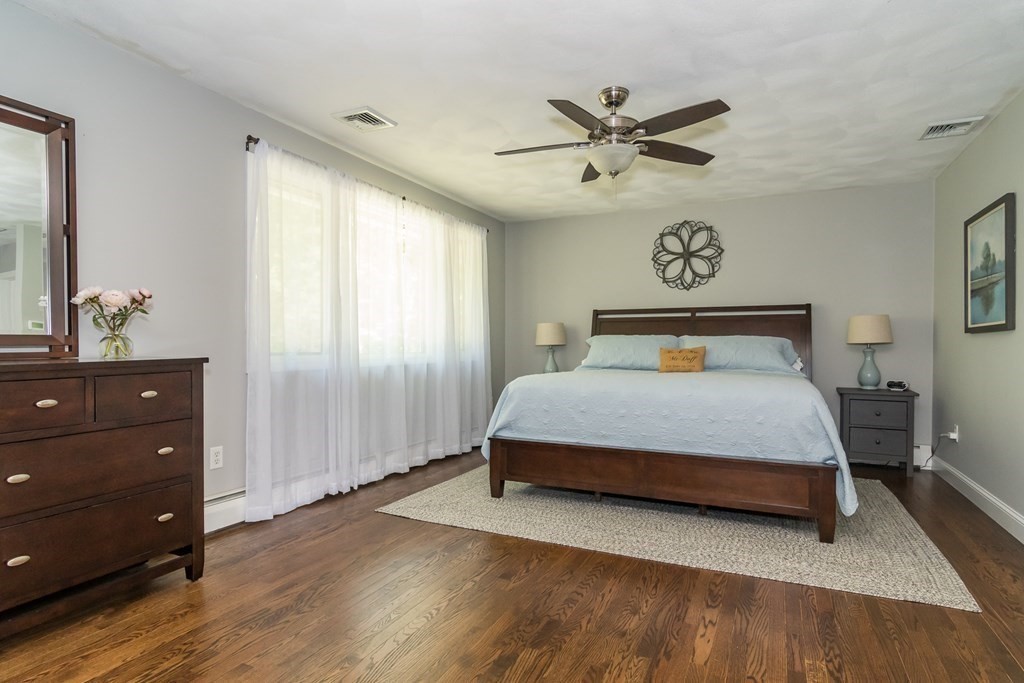 50 Ash Street Rehoboth, MA 02769 - Photo 19 of 34 a bedroom with a bed and a table