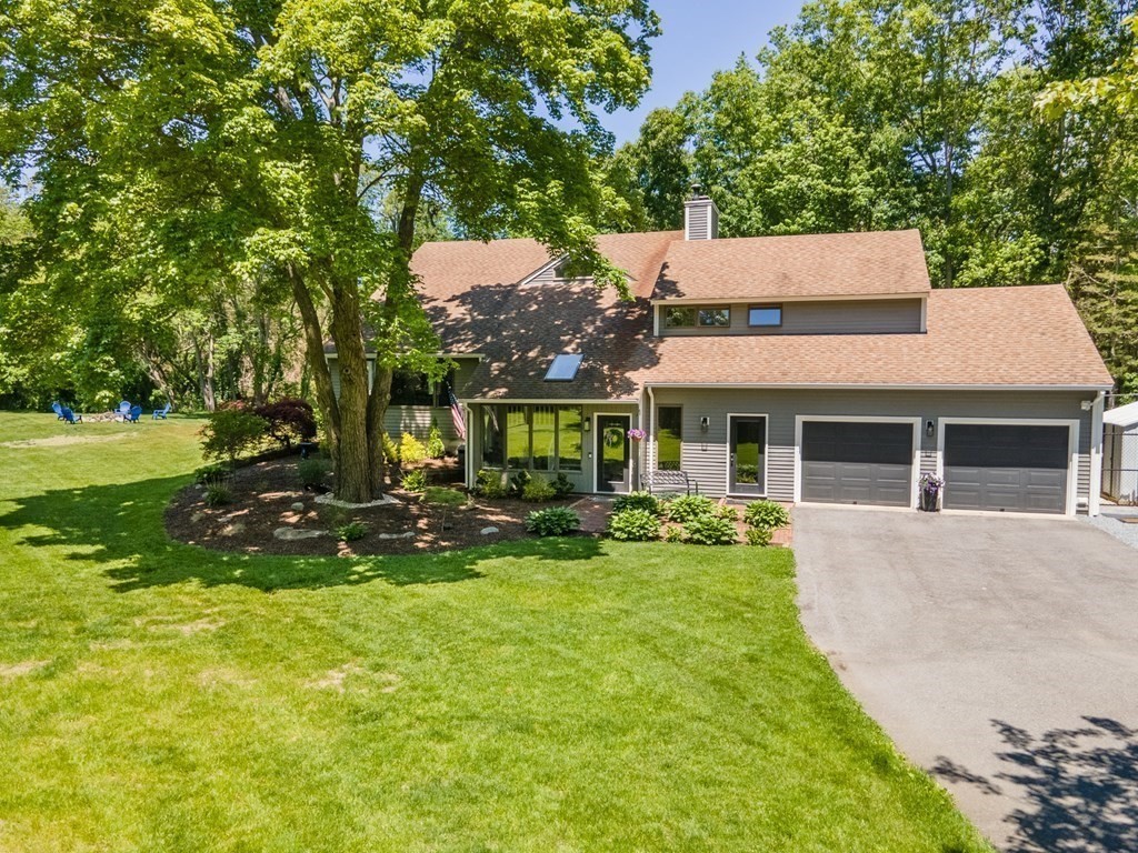 50 Ash Street Rehoboth, MA 02769 - Photo 33 of 34 a view of a house with backyard porch and sitting area