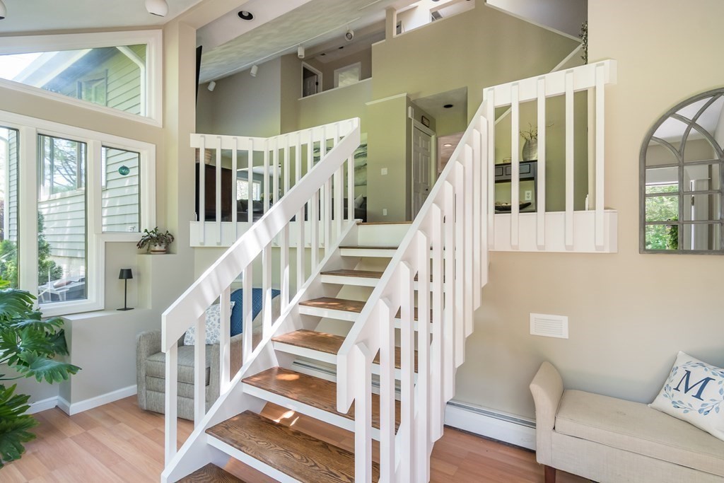 50 Ash Street Rehoboth, MA 02769 - Photo 5 of 34 a view of entryway and hall with wooden floor