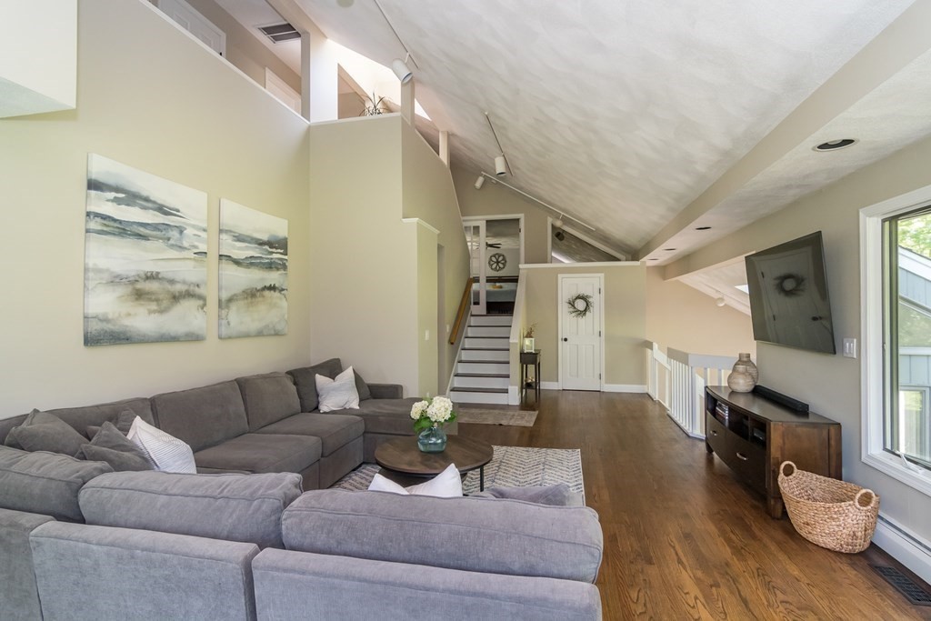 50 Ash Street Rehoboth, MA 02769 - Photo 7 of 34 a living room with furniture and wooden floor