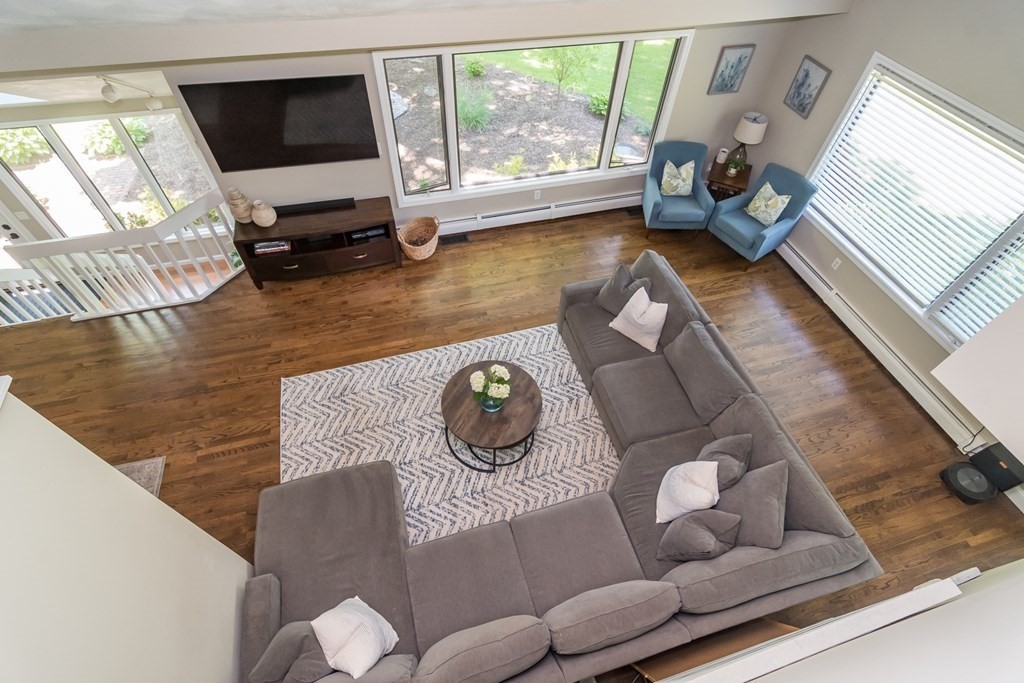 50 Ash Street Rehoboth, MA 02769 - Photo 9 of 34 a living room with furniture and a flat screen tv