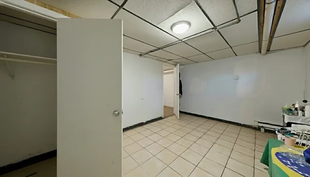 a view of a room with wooden walls