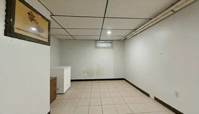 a view of a utility room with furniture
