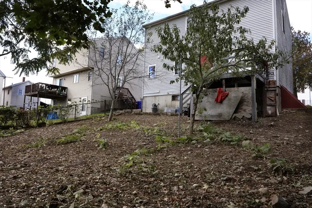 a car parked in front of a house