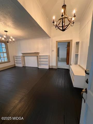 832 Elm Street Macon, GA 31201 - Photo 2 of 6 a view of a livingroom with furniture and chandelier fan wooden floor