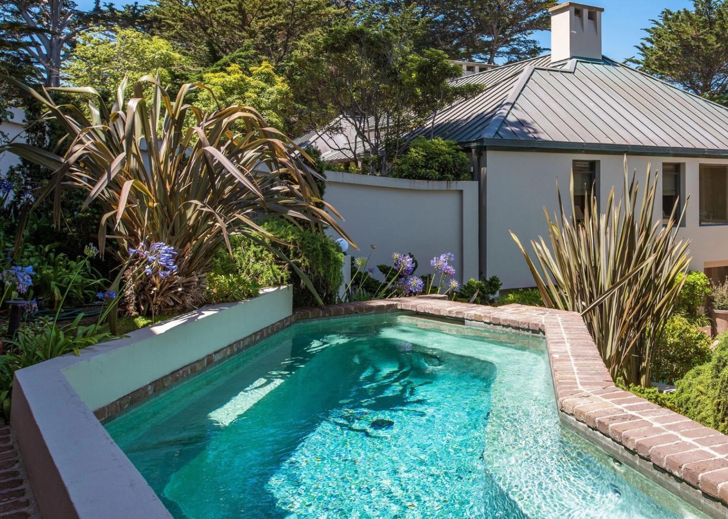 157-163 Spindrift Road Carmel, CA 93923 - Photo 71 of 100 a view of a backyard with plants