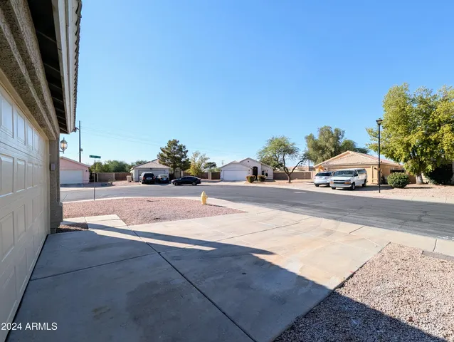 a view of a street with cars