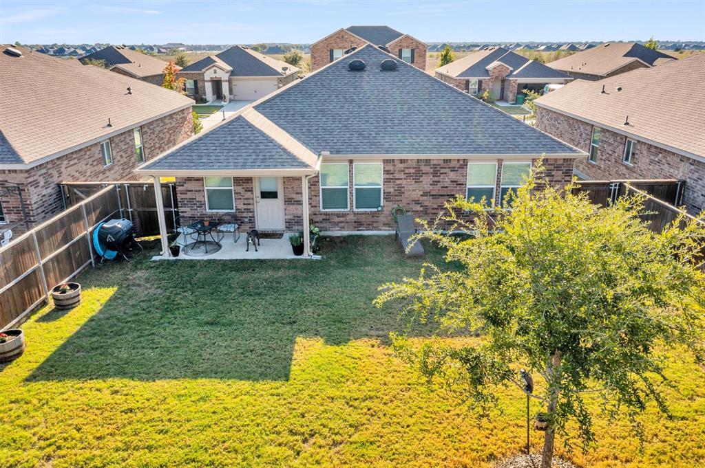 2208 Heaton Street Forney, TX 75126 - Photo 24 of 38 front view of a house with a yard