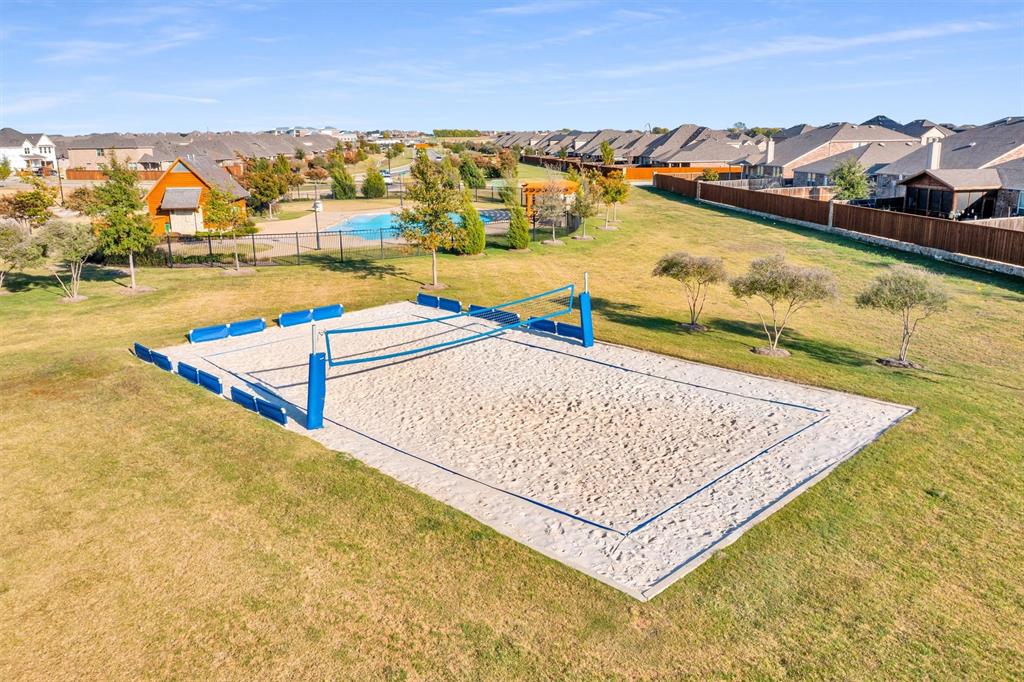 2208 Heaton Street Forney, TX 75126 - Photo 33 of 38 a view of swimming pool with an ocean view
