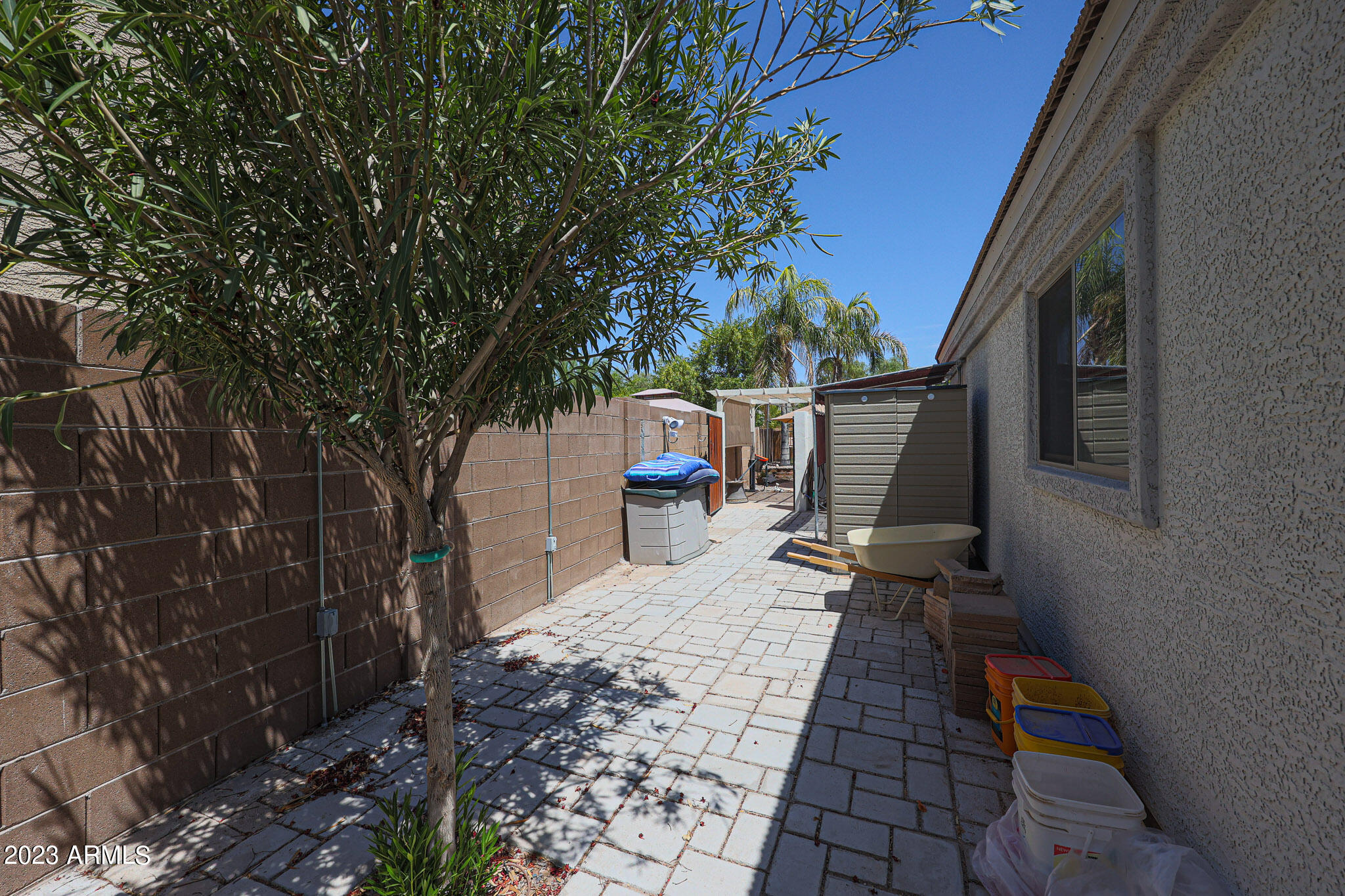 23636 West Pecan Road Buckeye, AZ 85326 - Photo 40 of 51 Side Yard w/Shed & Pavers