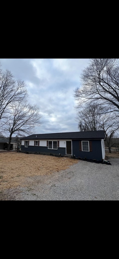 a view of swimming pool with an outdoor seating