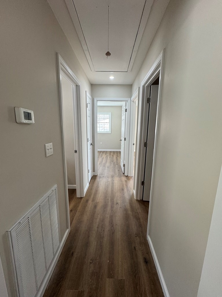 1106 East Railroad Street Waverly, TN 37185 - Photo 17 of 21 a view of a hallway with wooden floor