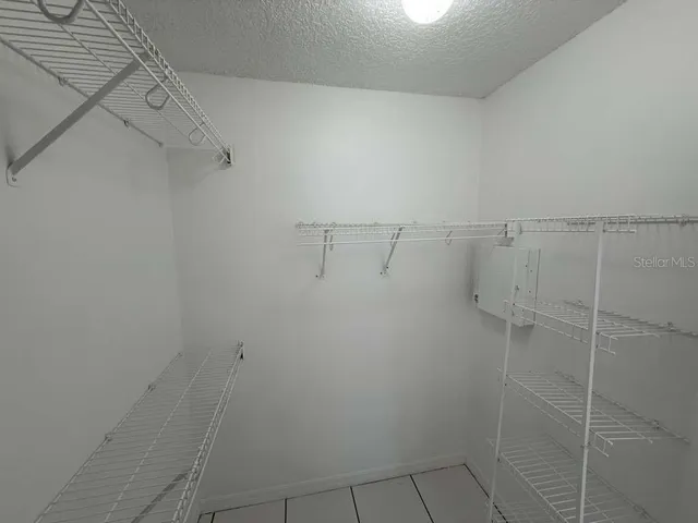 a view of a room with racks on the wall