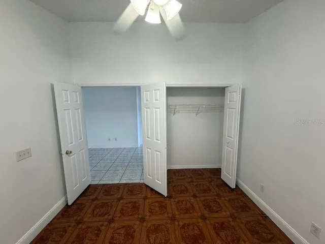 an empty room with closet