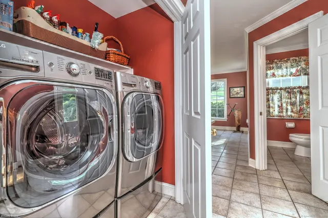 a utility room with dryer and washer