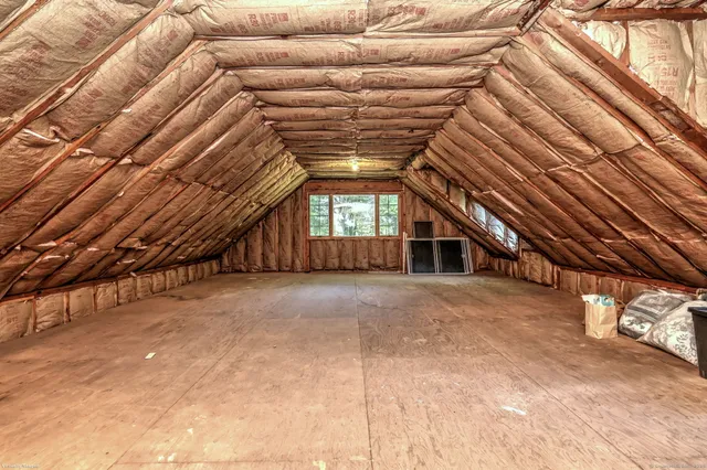 a view of a room with windows