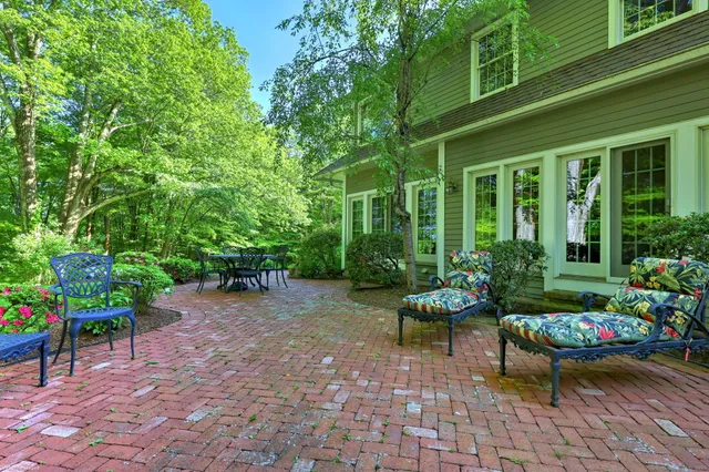 a garden with a seating space