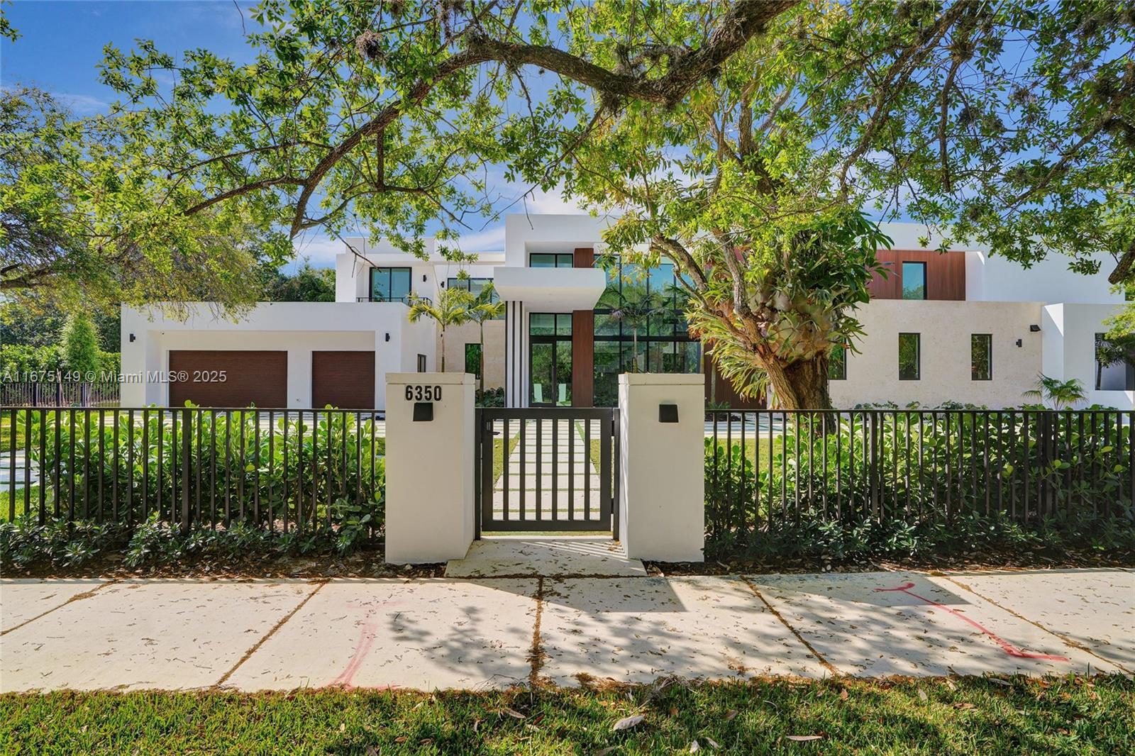 6350 Southwest 112th Street Pinecrest, FL 33156 - Photo 13 of 88 front view of a house