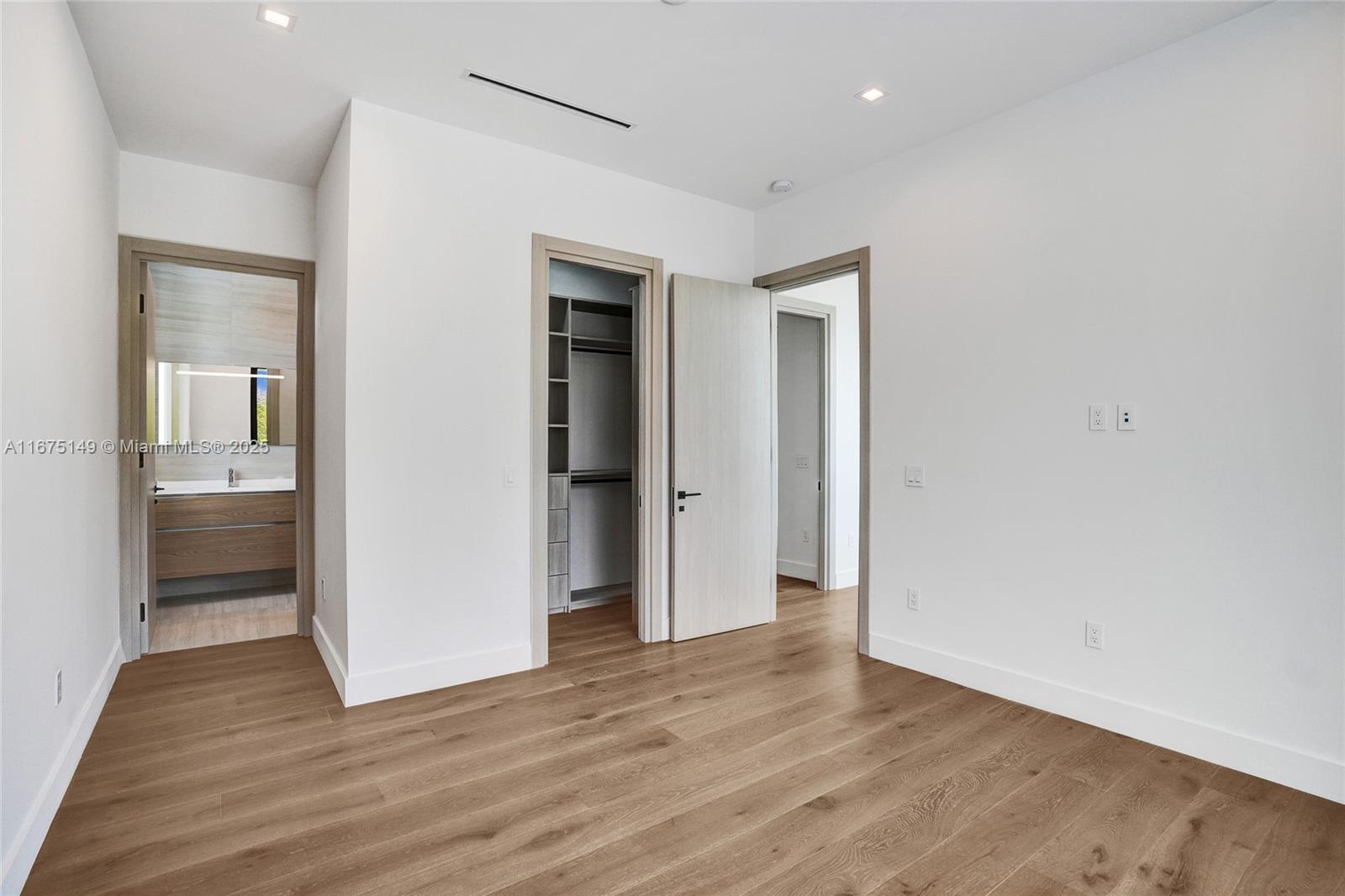 6350 Southwest 112th Street Pinecrest, FL 33156 - Photo 64 of 88 wooden floor in an empty room