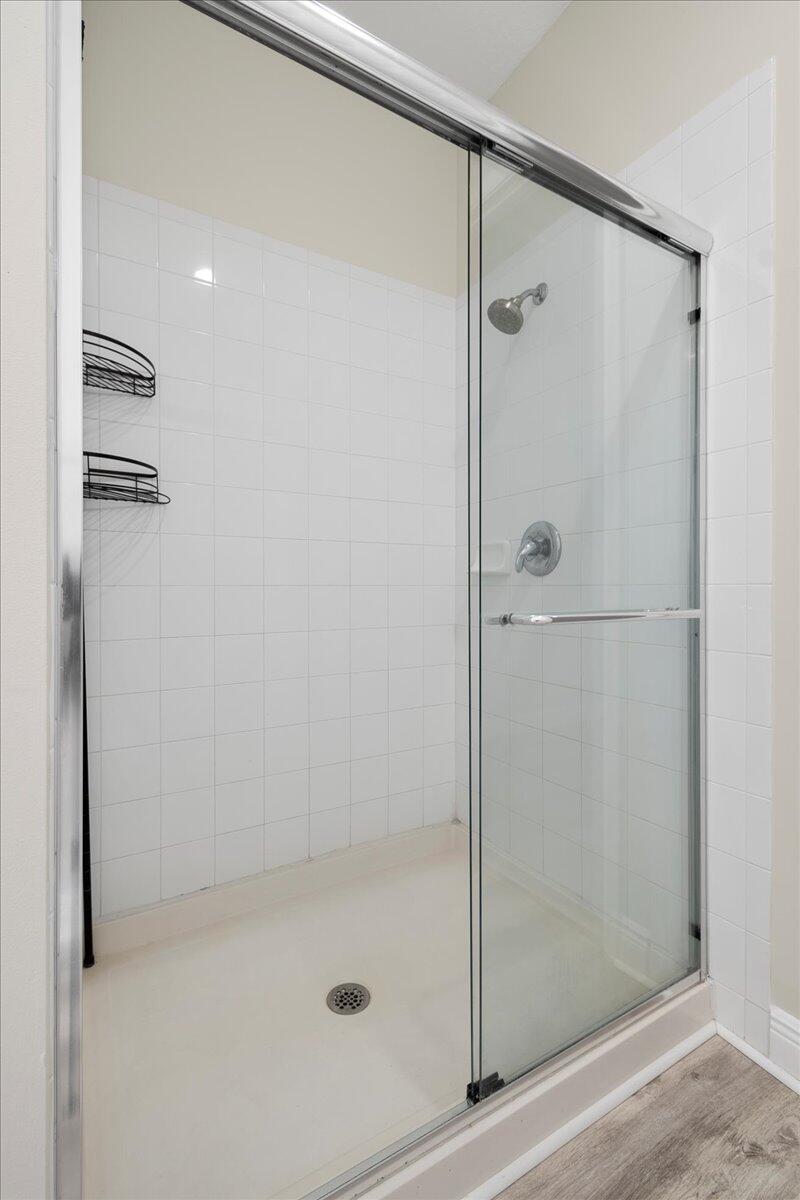802 University Boulevard Jupiter, FL 33458 - Photo 24 of 40 a bathroom with a shower