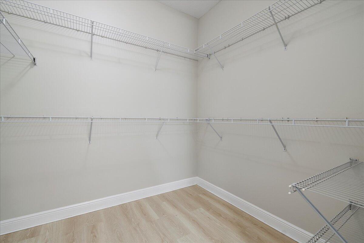 802 University Boulevard Jupiter, FL 33458 - Photo 25 of 40 a view of a room with racks on the wall