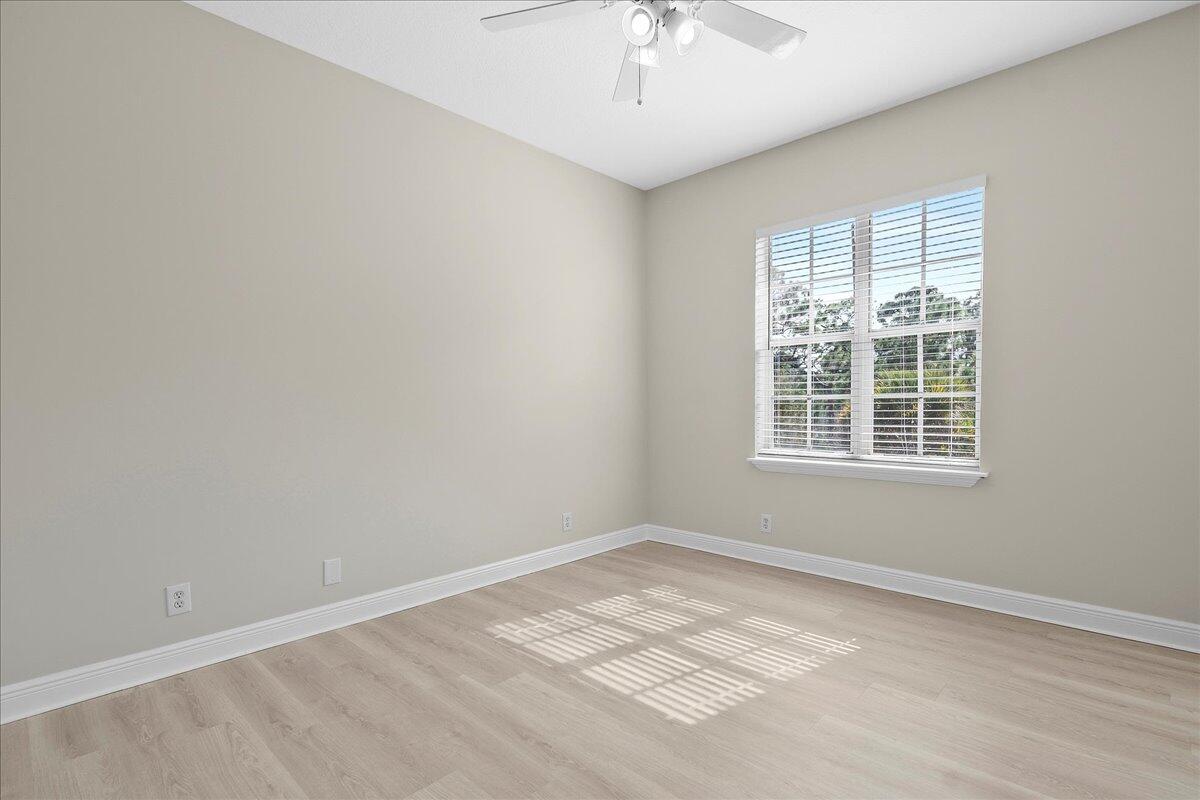 802 University Boulevard Jupiter, FL 33458 - Photo 26 of 40 an empty room with a window