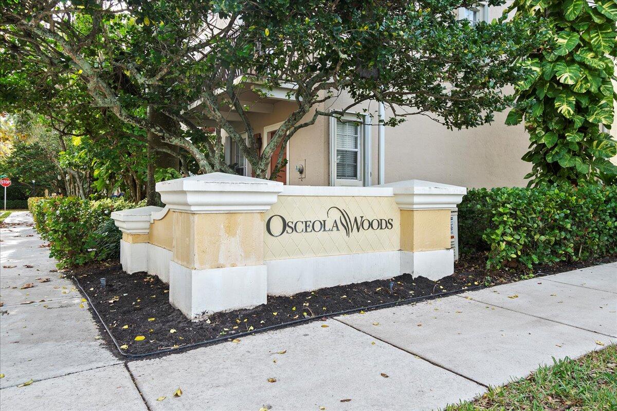 802 University Boulevard Jupiter, FL 33458 - Photo 40 of 40 a sign that is on a pole