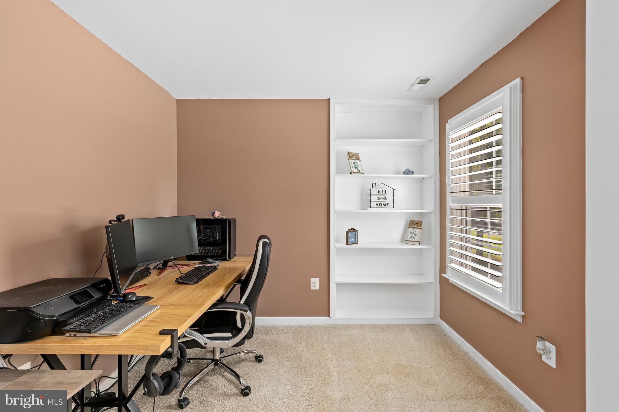296 Robbie Road Bumpass, VA 23024 - Photo 18 of 51 Nook off Primary Bedroom with Built-in Shelves