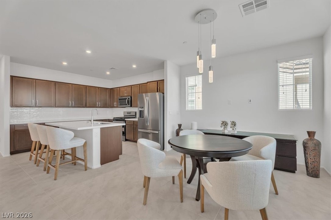 635 Bellus Place Henderson, NV 89015 - Photo 17 of 37 Dining area featuring recessed lighting