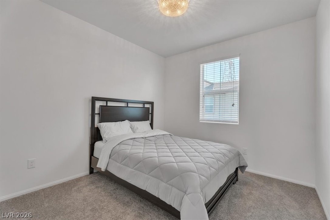 635 Bellus Place Henderson, NV 89015 - Photo 21 of 37 Bedroom featuring baseboards and carpet flooring