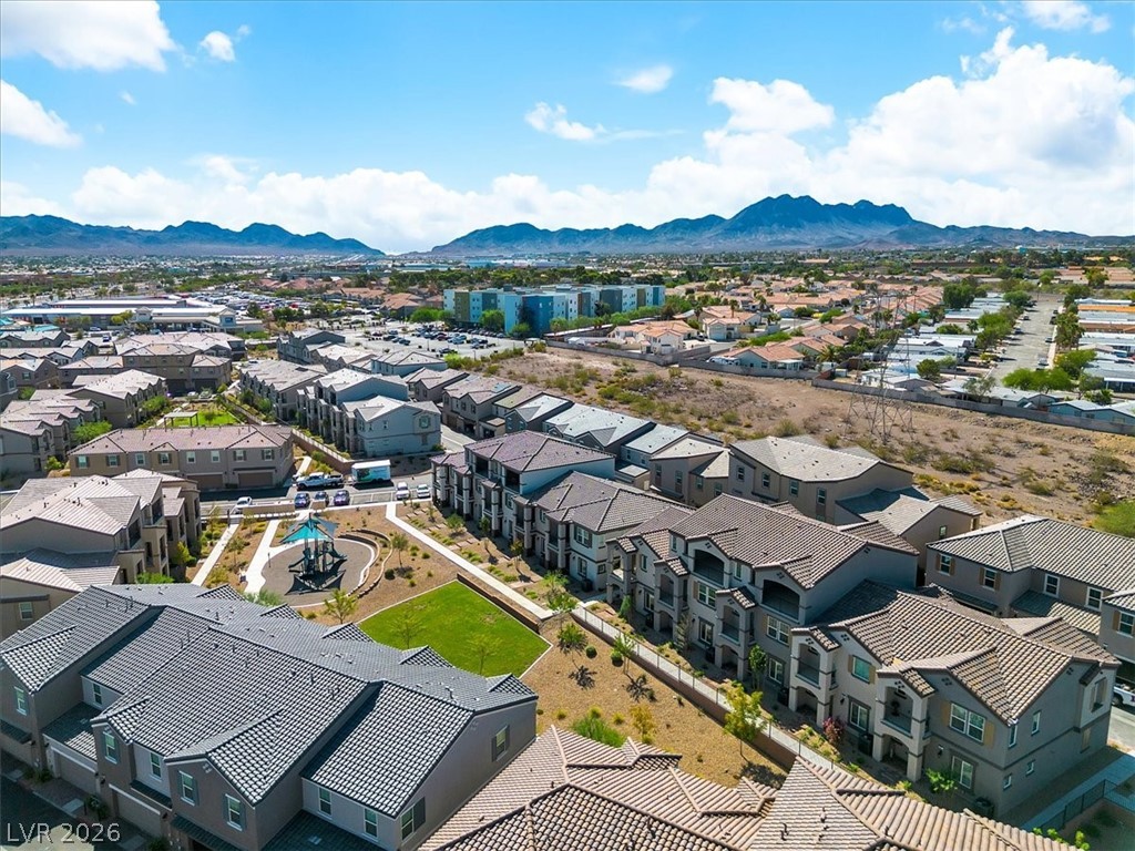 635 Bellus Place Henderson, NV 89015 - Photo 30 of 37 Aerial perspective of suburban area with a mountain backdrop