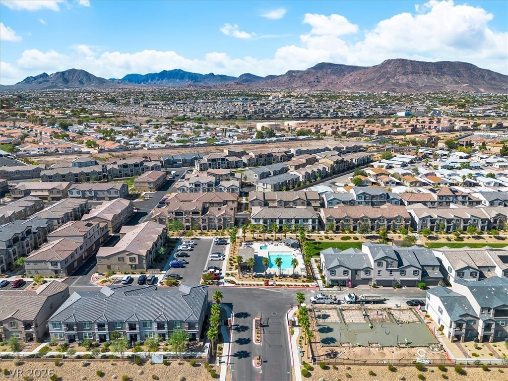 635 Bellus Place Henderson, NV 89015 - Photo 34 of 37 Aerial view of residential area featuring a mountainous background