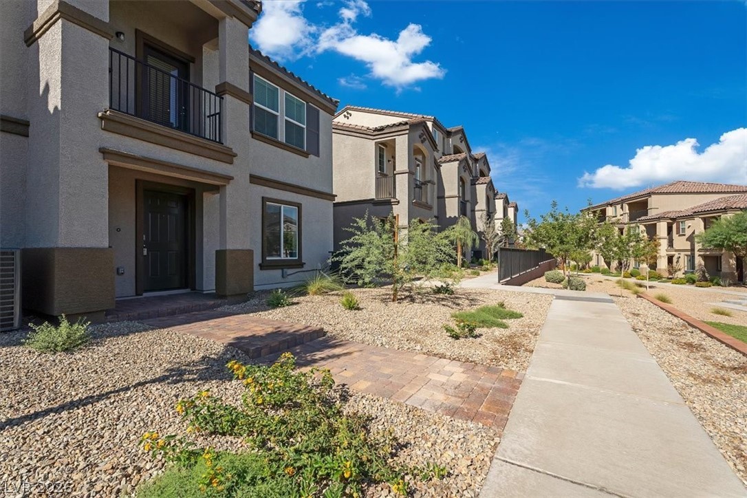 635 Bellus Place Henderson, NV 89015 - Photo 4 of 37 View of property's community featuring a balcony and a residential view