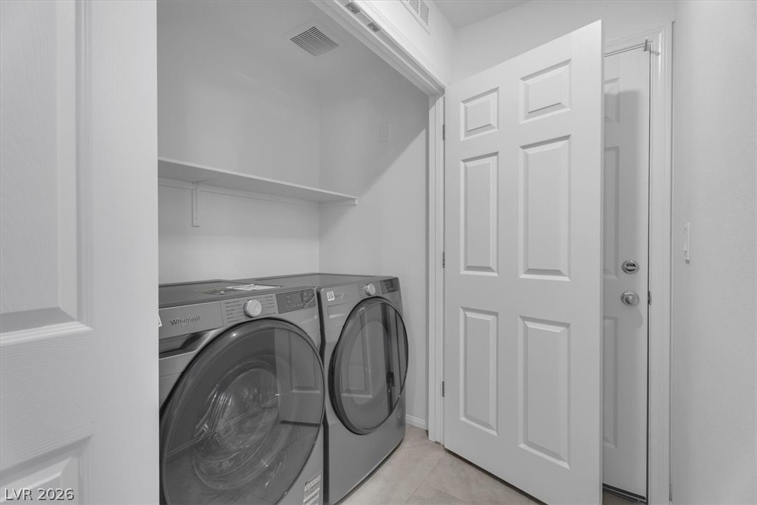 635 Bellus Place Henderson, NV 89015 - Photo 8 of 37 Laundry area with separate washer and dryer