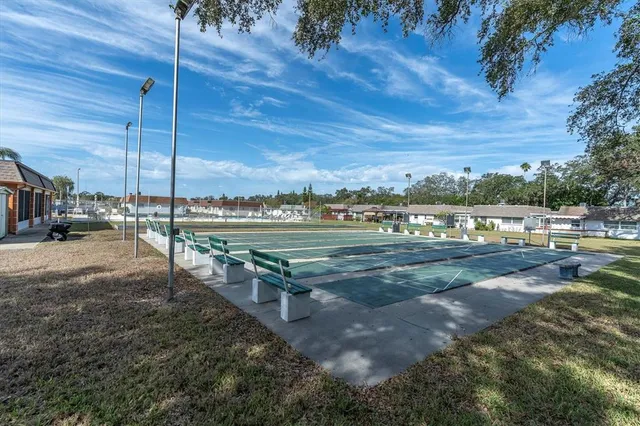 a view of a town with seating area