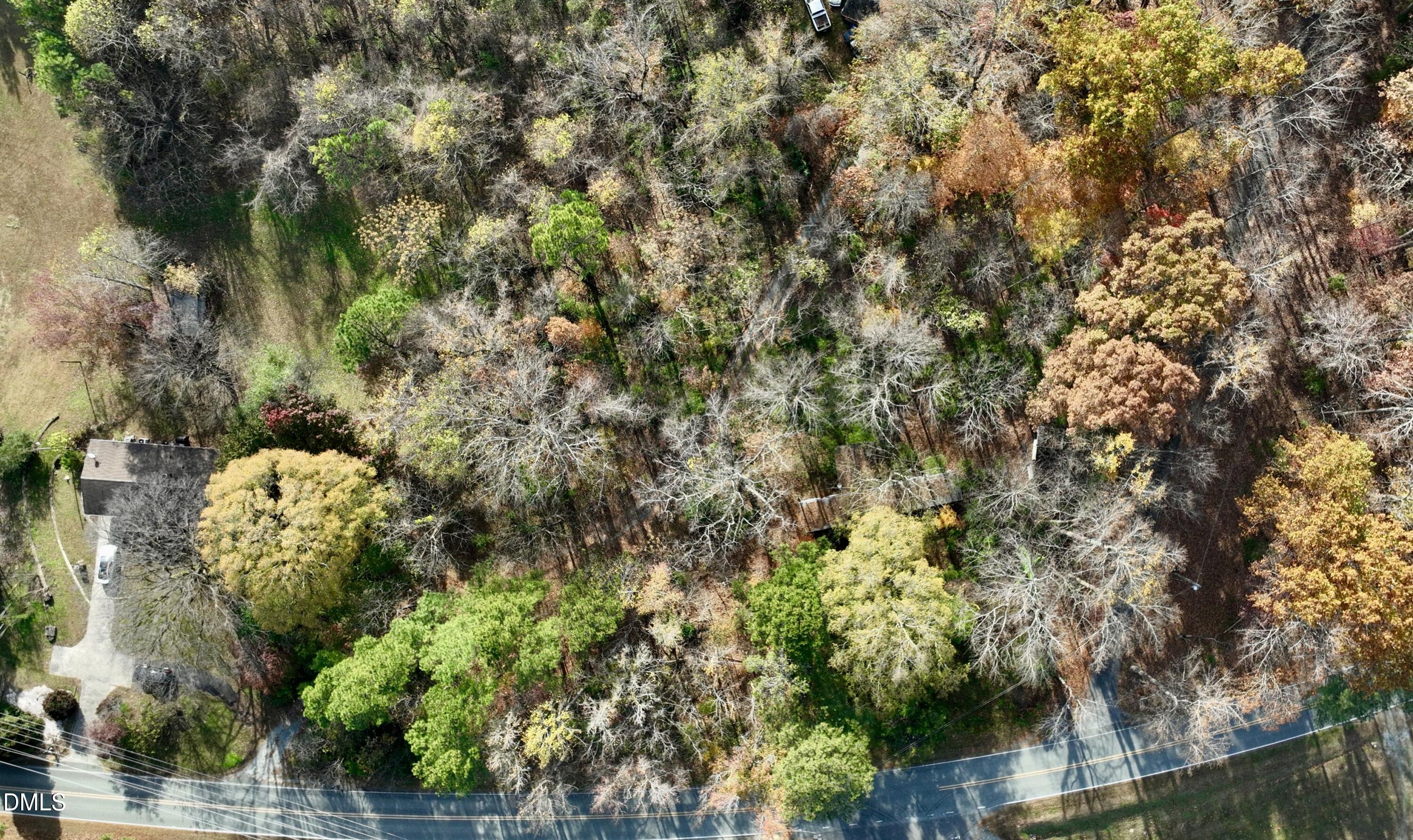 2407 Damascus Church Road Chapel Hill, NC 27516 - Photo 2 of 9 a view of a house with a tree