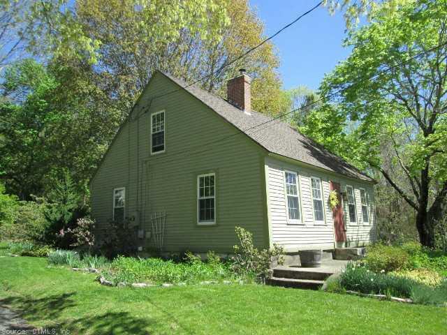 64 Machine Shop Hill Road Windham, CT 06266 - Photo 1 of 1 a front view of a house with a yard