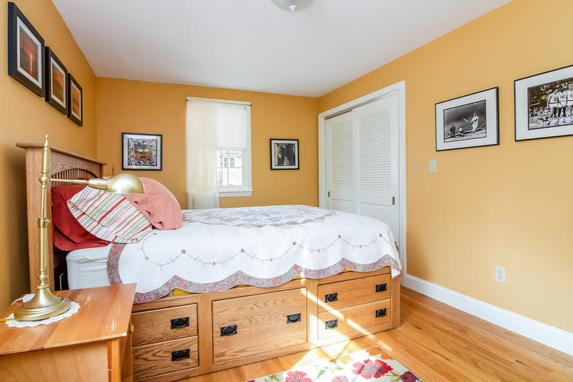24 Stephen Road Bourne, MA 02532 - Photo 11 of 20 a bedroom with a bed and wooden floor
